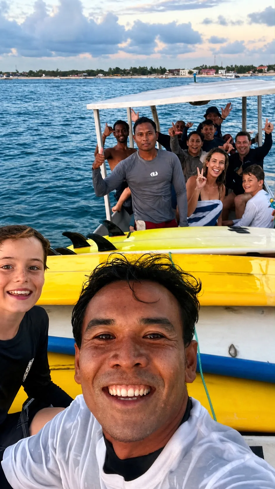 Loxy and his instructors, including Lowlek, with a boatful of stoked students at Nusa Lembongan